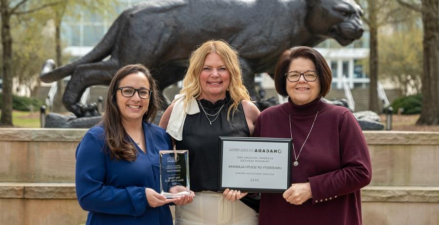 The Academic Advising and Transfer Services office at the University of South Alabama, led by Associate Director Patricia Davis, left, and Executive Director Catherine Preston, center, recently received the 2024 Advising Innovation Award from the National Academic Advising Association. Nani Perez-Uribe, right, transfer coordinator, was named as one of four Rising Stars by the National Institute for the Study of Transfer Students. 